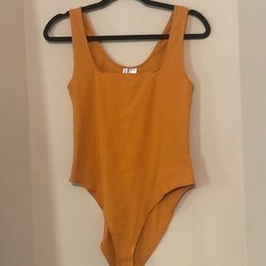 H and M gold body suit